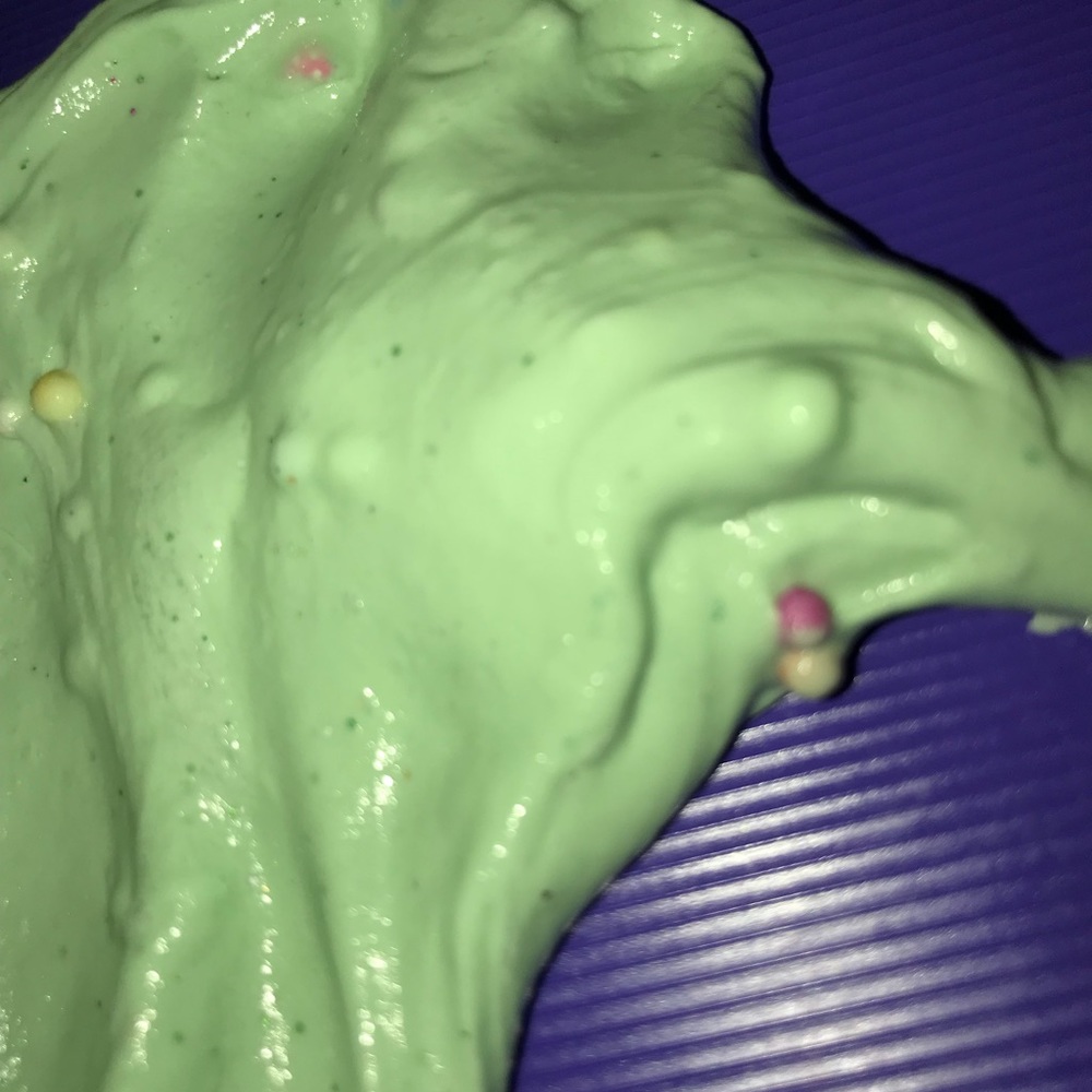 A mint green butter slime